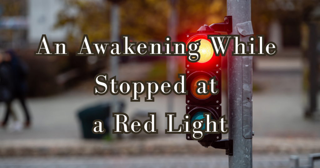 An Awakening While Stopped at a Red Light